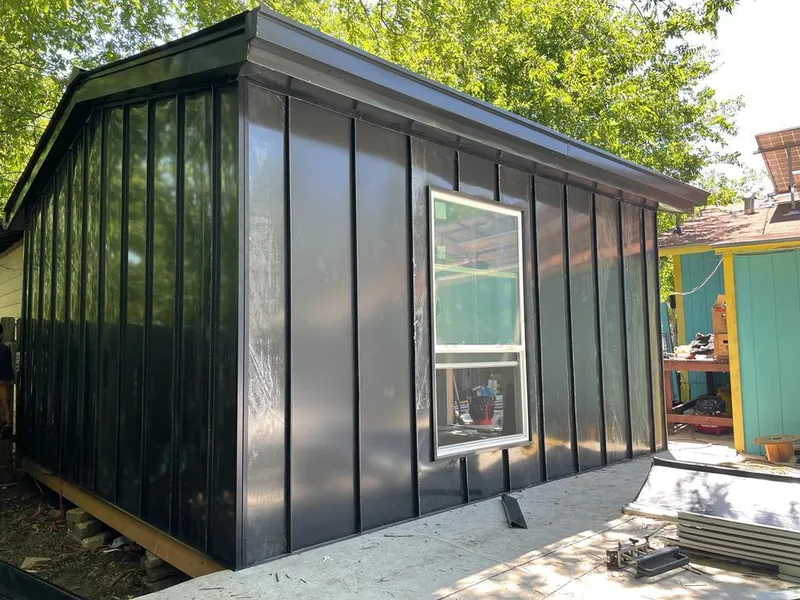 Black standing seam metal wall panels for Roof Inspection in Zephyrhills